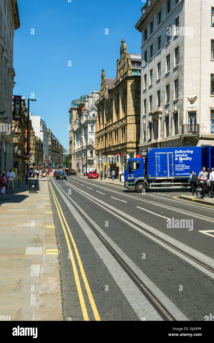 Newly laid tram tracks along Cross Street, Manchester, England, UK, during construction of a 2nd line through the city centre. Stock Photo