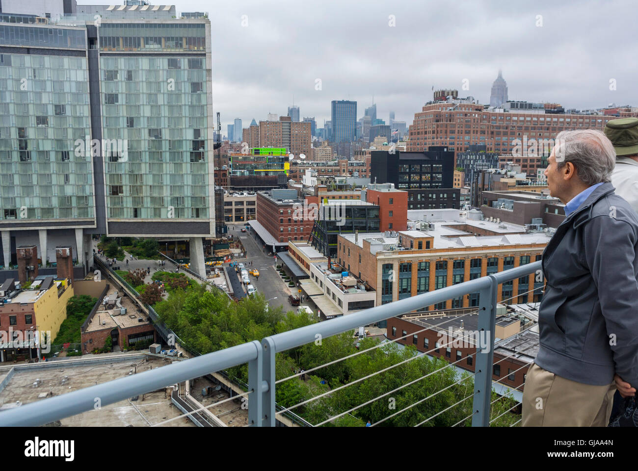 New York City, NY, USA, senior Man Visiting Outside in Modern American Art Museum, Downtown Whitney Museum, Aerial, Meat Packing District Neighborhood, city buildings Stock Photo