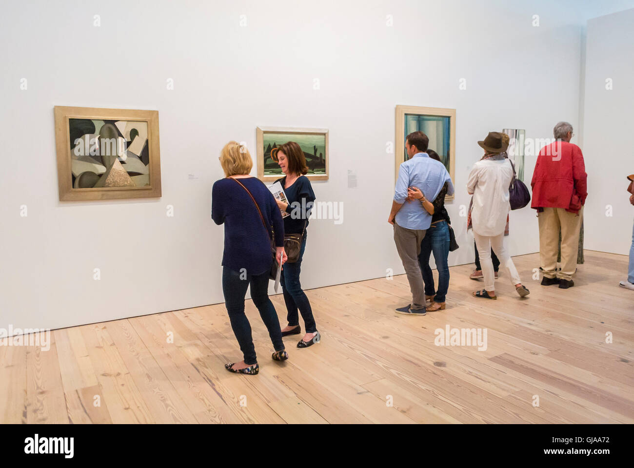 New York City, NY, USA, Tourists Visiting in Modern American Art Museum, Looking at modern paintings on Display, Downtown Whitney Museum, in Meat Packing District Neighborhood Stock Photo