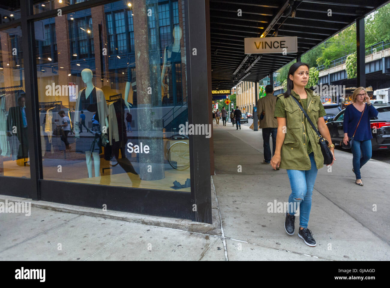 New York City, NY, USA, Street Scene, Woman Walking near Fashion Shop Window Scene on Sidewalk in Meat Packing District Neighborhood, Local neighbourhoods, clothes shopping  [USA] Stock Photo
