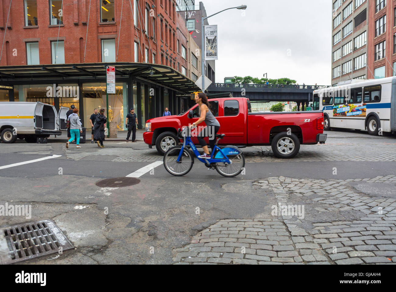 New York City, NY, USA, Young Woman on Public Share Bicycle bicycling on Street in Meat Packing District Local Neighborhoods Stock Photo