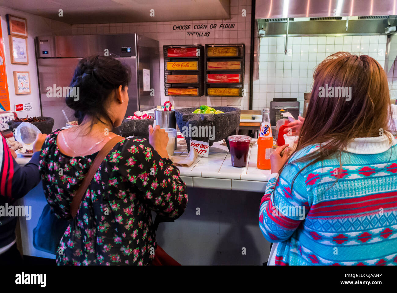 New York, NY, USA, Women Ordering Food at Counter of Mexican Food Restaurant in CHelsea Market, Stock Photo