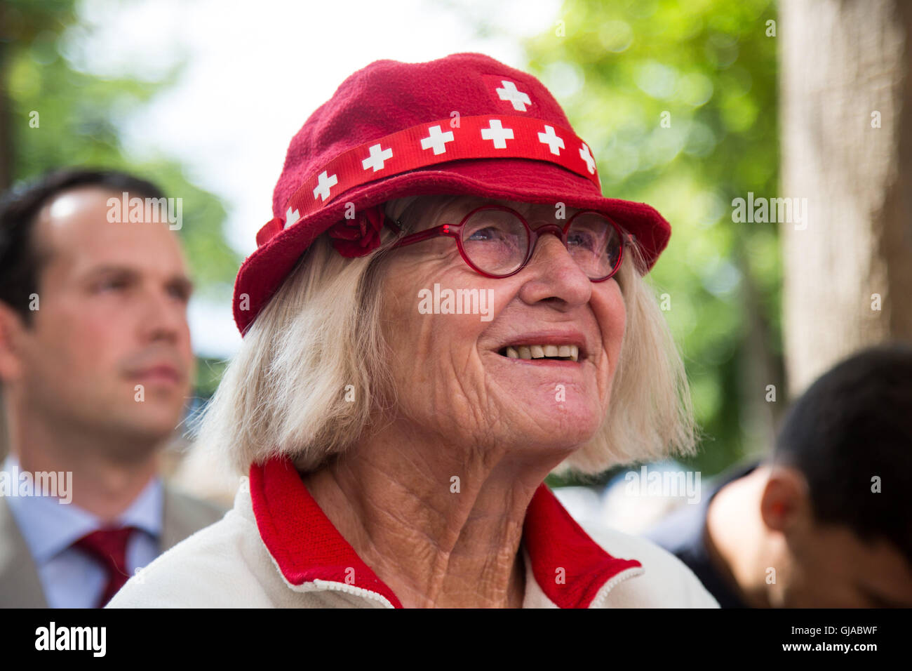 01/08/2016. Zurich, Switzland. A women wears a patriotic hat at a ceremony in Zurich in celebration of Swiss National Day. Stock Photo
