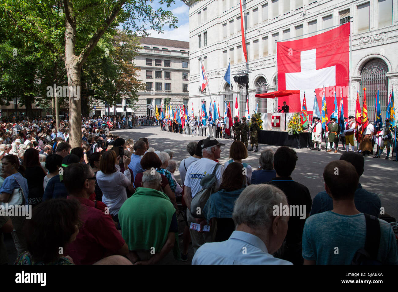 Crowds watch on at a ceremony in Zurich in celebration of Swiss National Day. Stock Photo