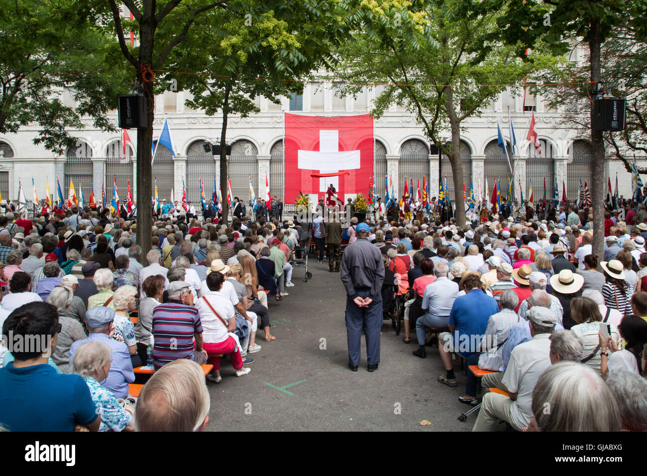 Crowds watch on at a ceremony in Zurich in celebration of Swiss National Day. Stock Photo
