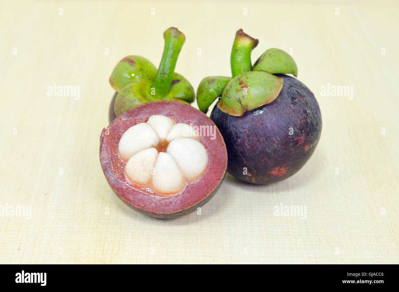 Mangosteen (Other names are garcinia, mangostana, clusiaceae, saptree, purple mangosteen, monkey fruit, Malpighiales) fruit with Stock Photo