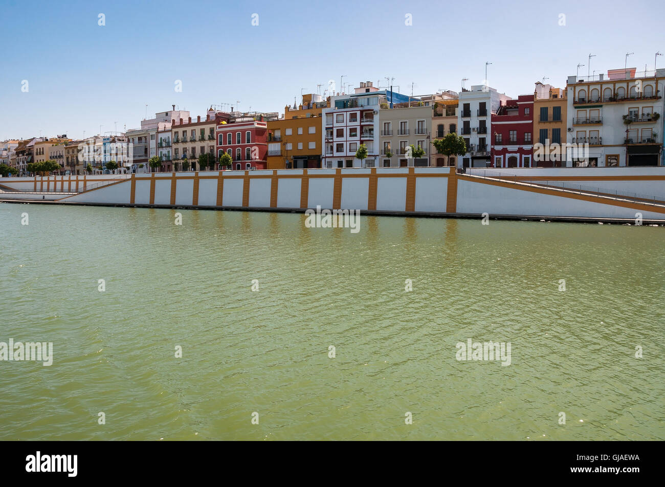 View of Betis street in Triana district of Seville from the Guadaquivir river, Spain Stock Photo
