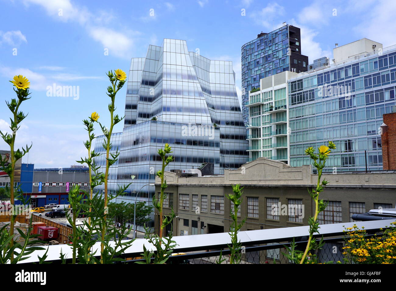 A view of the IAC (InterActive Corp) and 100 Eleventh Ave buildings from the High Line in the Chelsea area in New York City, NY Stock Photo
