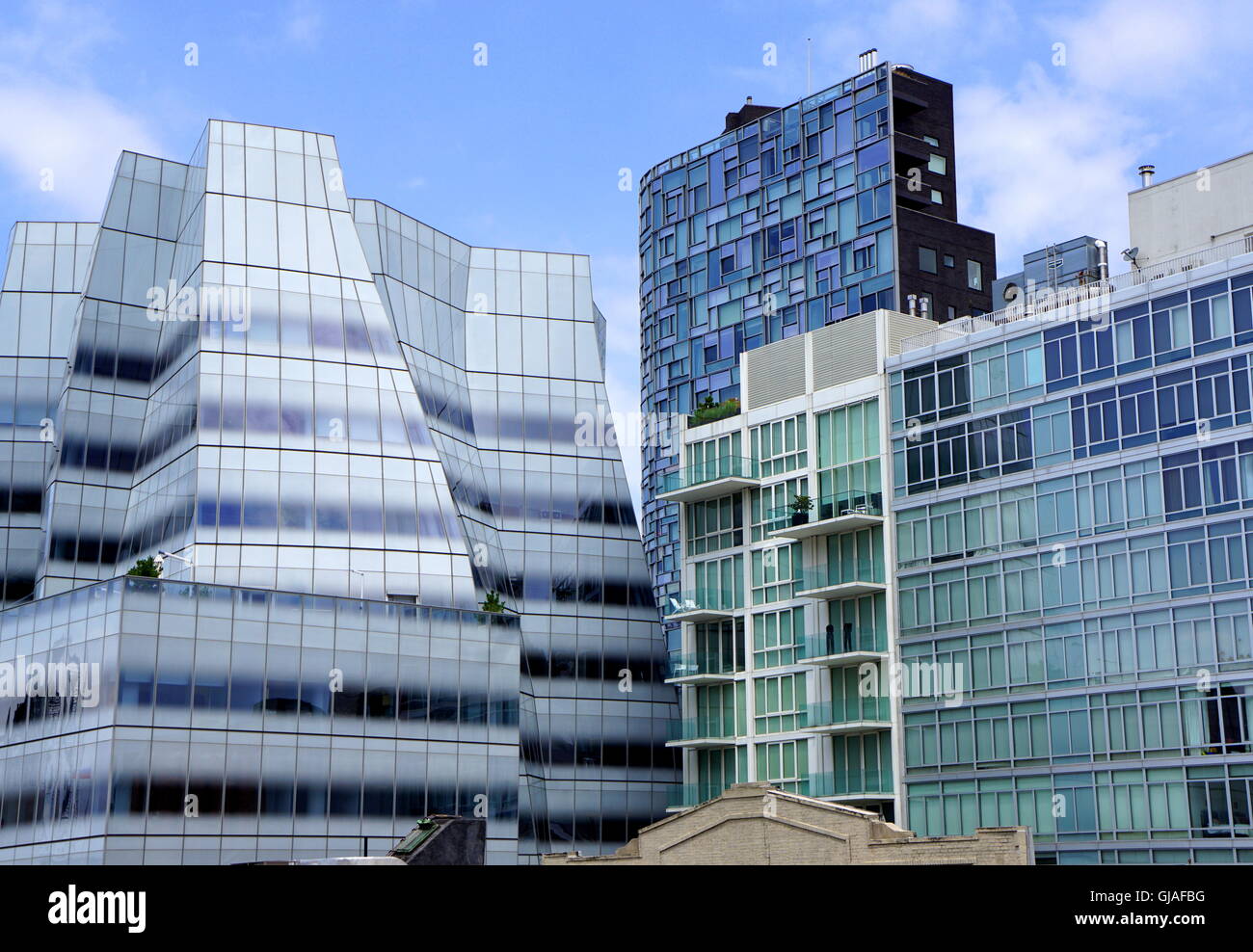 A view of the IAC (InterActive Corp) and 100 Eleventh Ave buildings from the High Line in the Chelsea area in New York City, NY Stock Photo