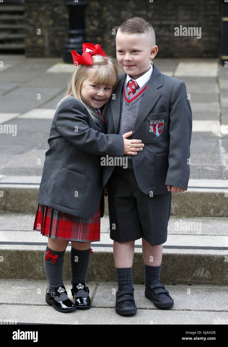 Olivia (left) and Rhogen McCurry (5), one of 15 sets of twins from the ...