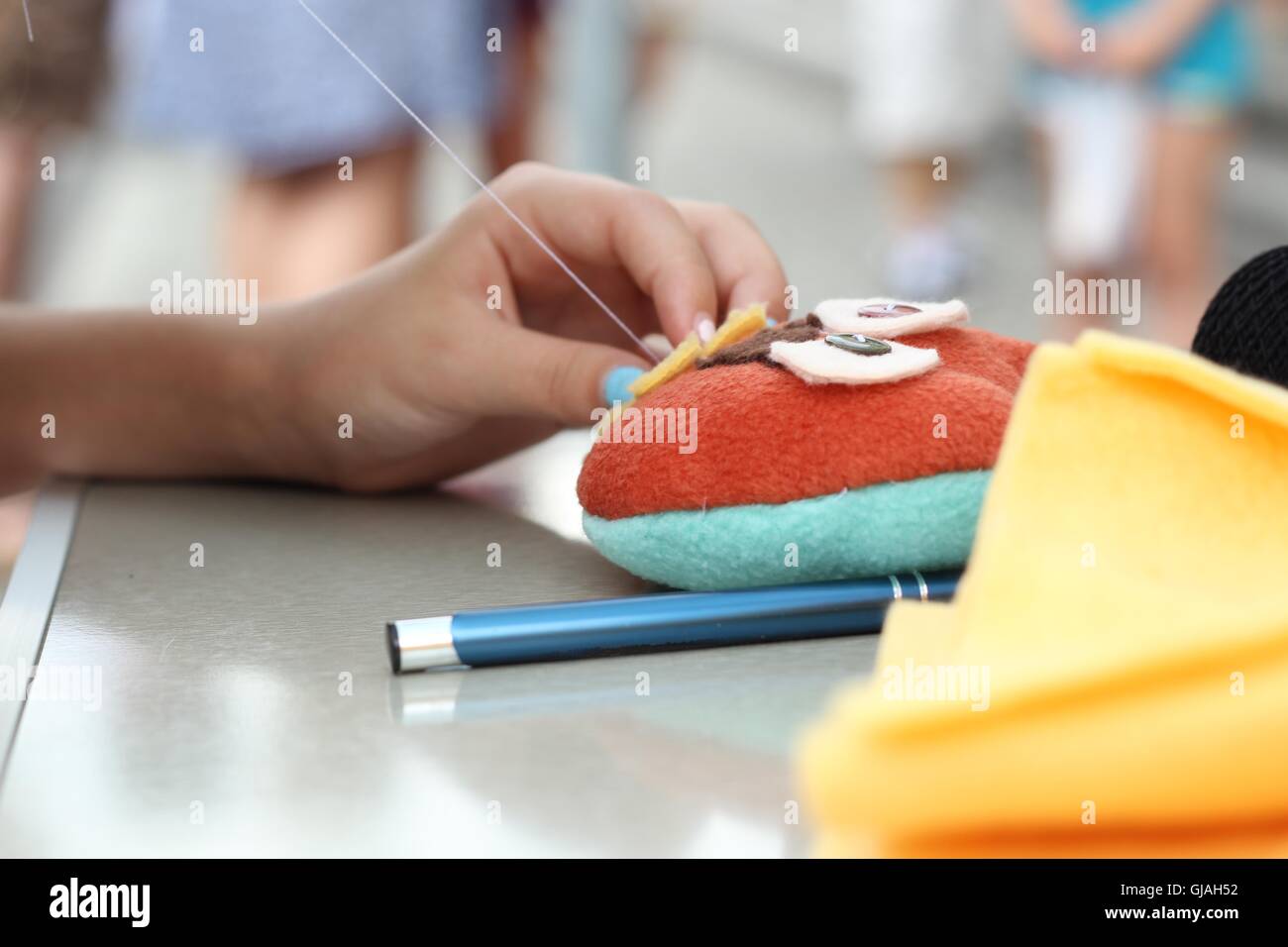 hand sawing toy - creative hobby in childrens hand Stock Photo