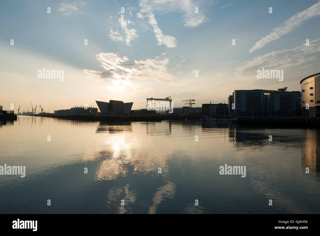 The Titanic building along side the famous Harland and Wolff cranes in the Titanic Quarter, Belfast Stock Photo