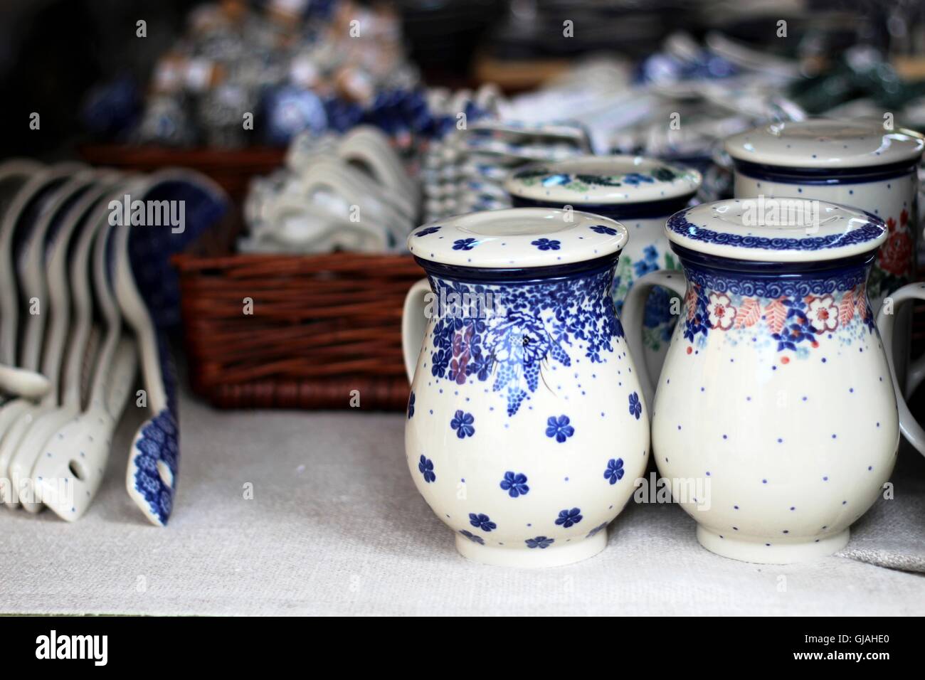 Handmade ceramics cups from factory Ceramika Artystyczna on the marketplace during Polish Pottery Festival in Boleslawiec,Poland Stock Photo
