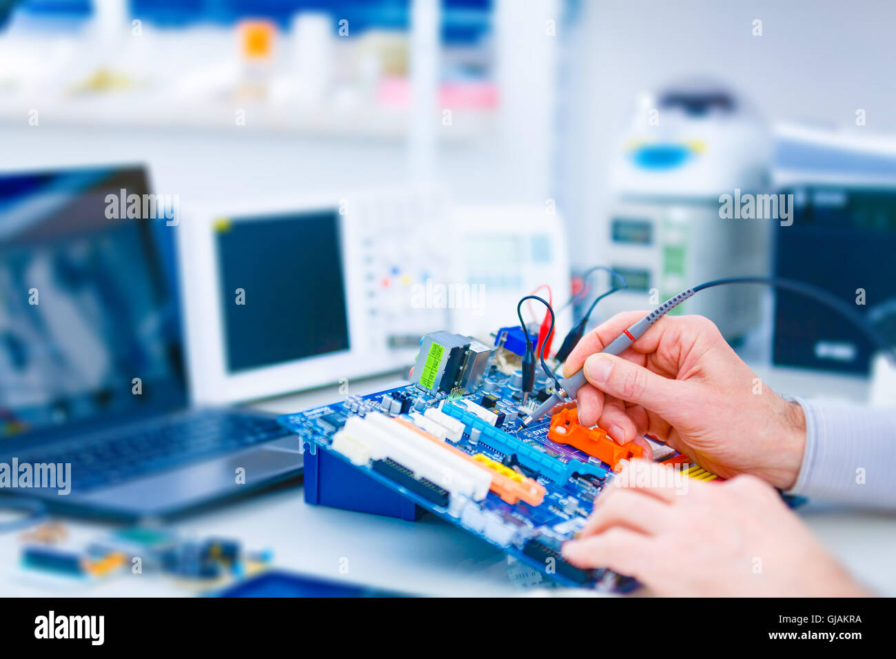Category Disappointed semiconductor Repair motherboard in electronics laboratory. Technological background with  closeup on tester checking motherboard. Electronics Stock Photo - Alamy