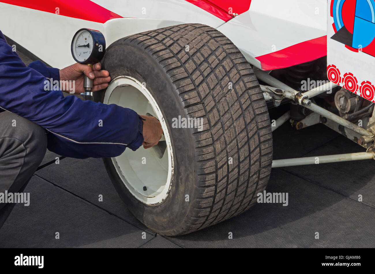 Rear R Car Test Checking the rear wheel of a racing car before the test drive Stock ...