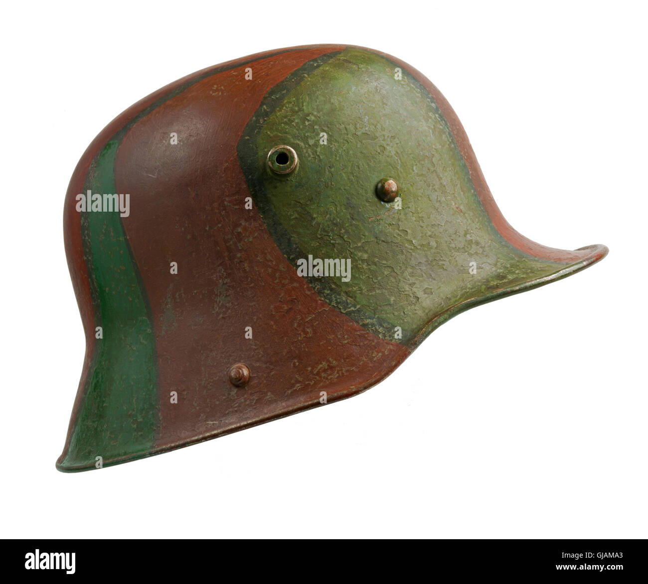 A German World War One (Stahlhelm M1916) military helmet, with camouflage paint applied. Stock Photo