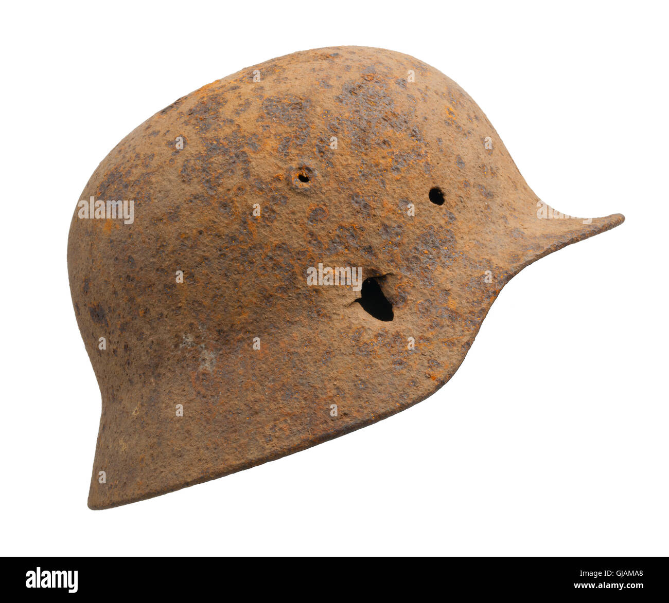A rusty German World War Two (Stahlhelm M1940) military helmet. Stock Photo