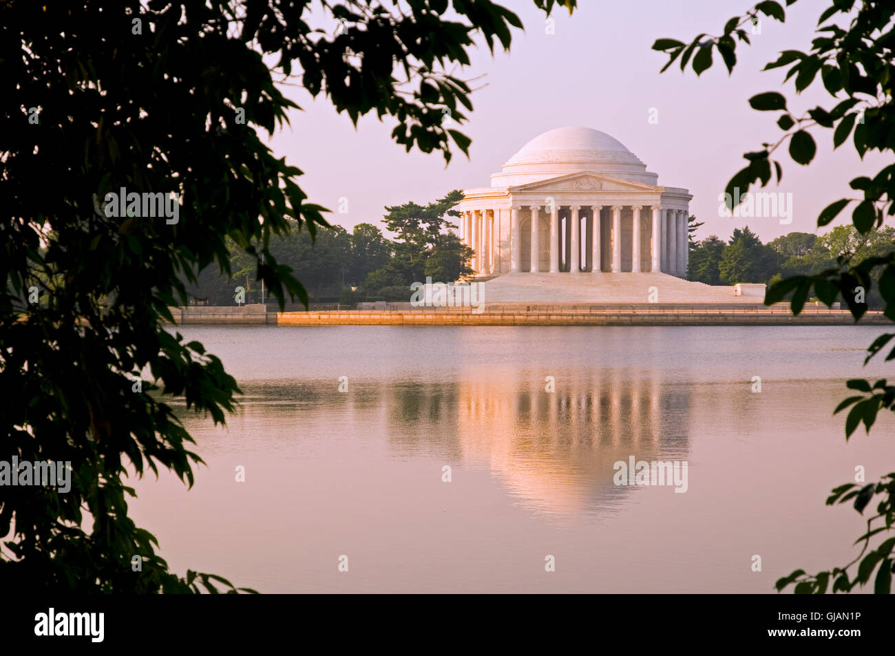 The Thomas Jefferson Memorial photographed across the Tidal Basin shortly after dawn. Stock Photo