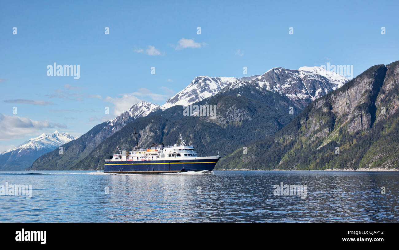 Alaskan Marine System ferry in the Lynn Canal near Haines in summer. Stock Photo