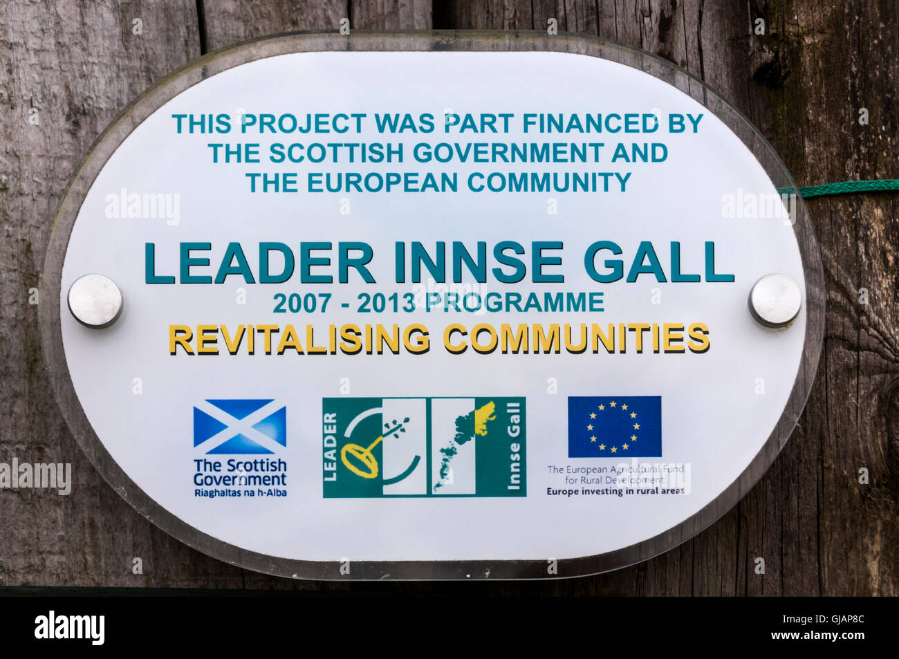 A sign on Langass Community Woodland on the Isle of Lewis records that it was partly funded by the EU and displays EU insignia. Stock Photo