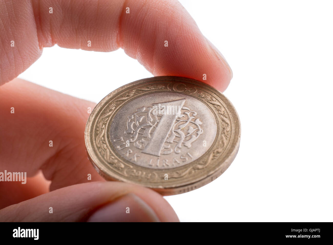 Turkish Currency coin in hand Stock Photo - Alamy