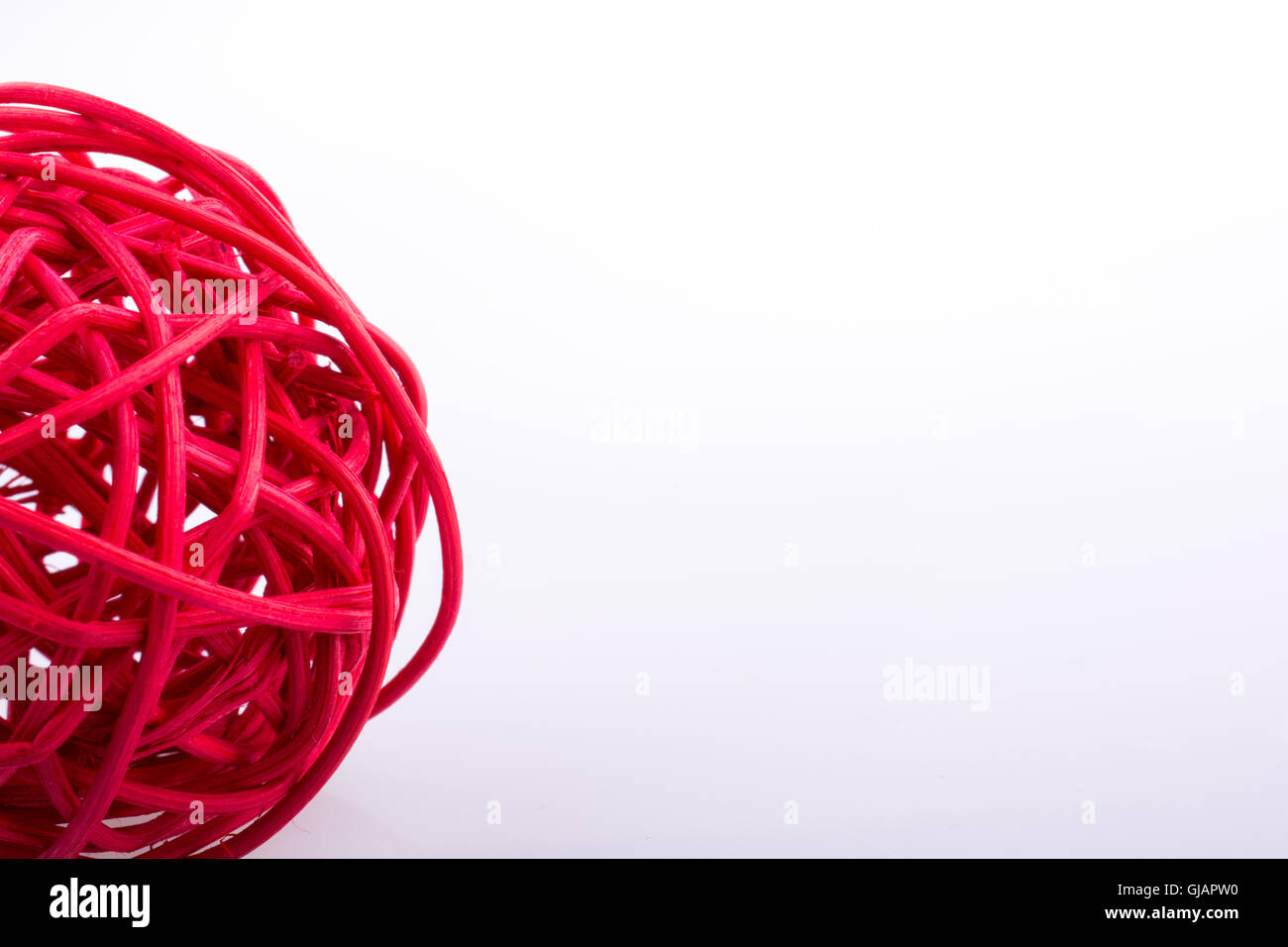 red wooden ball on a white background Stock Photo Alamy