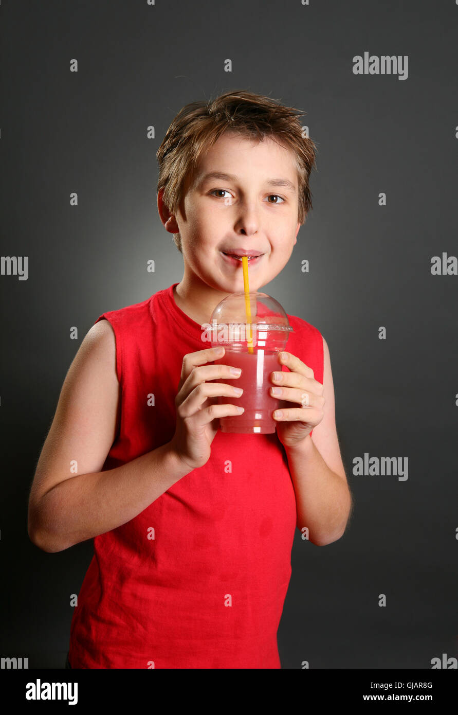 Child drinking fresh berry juice Stock Photo Alamy
