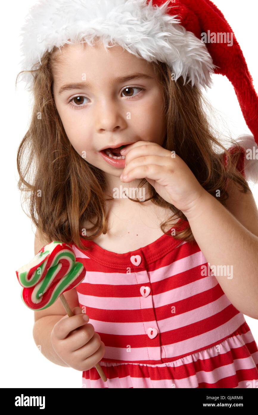 Little girl eating candy Stock Photo Alamy