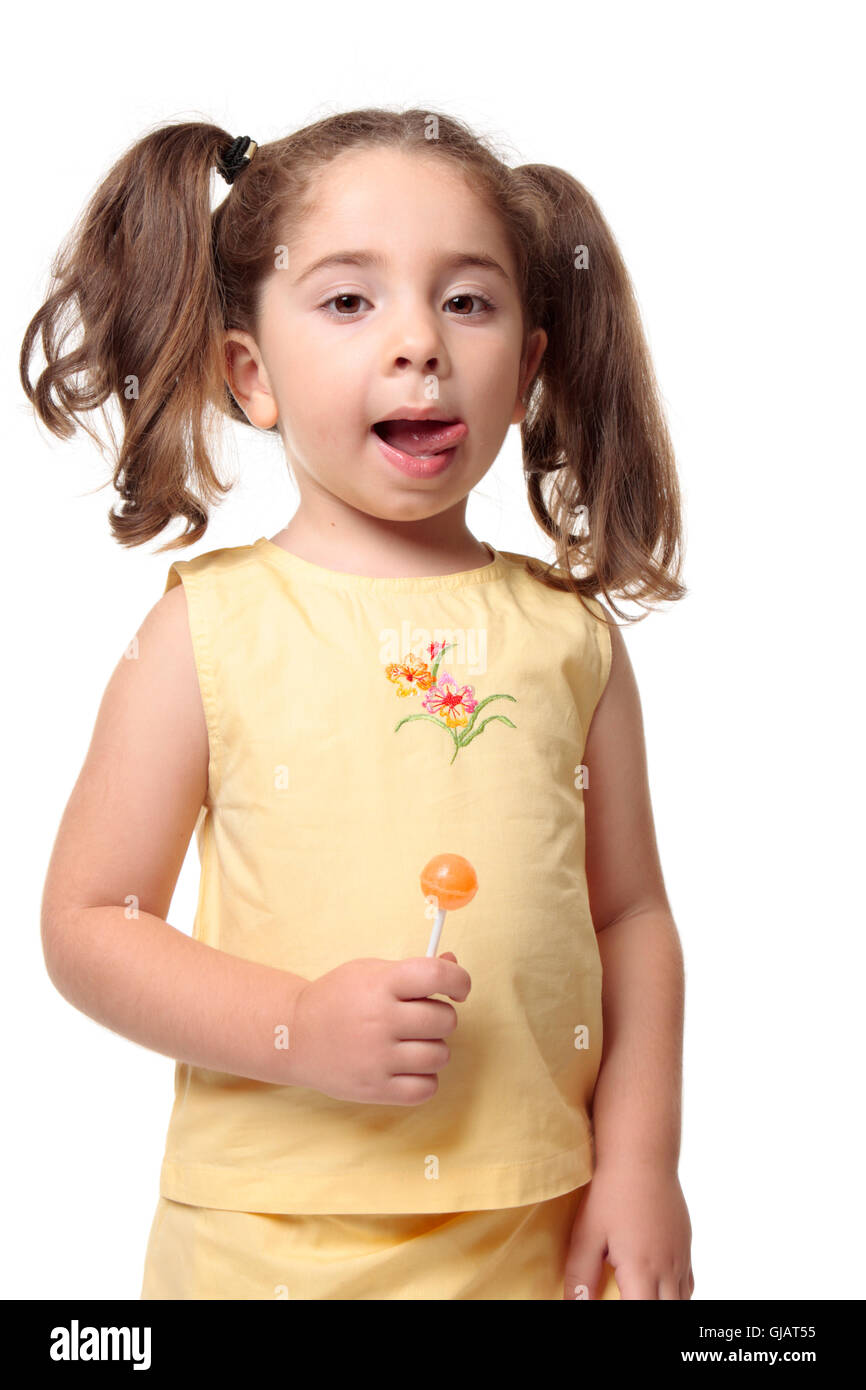 little licking Little girl licking lips delicious Stock Photo - Alamy