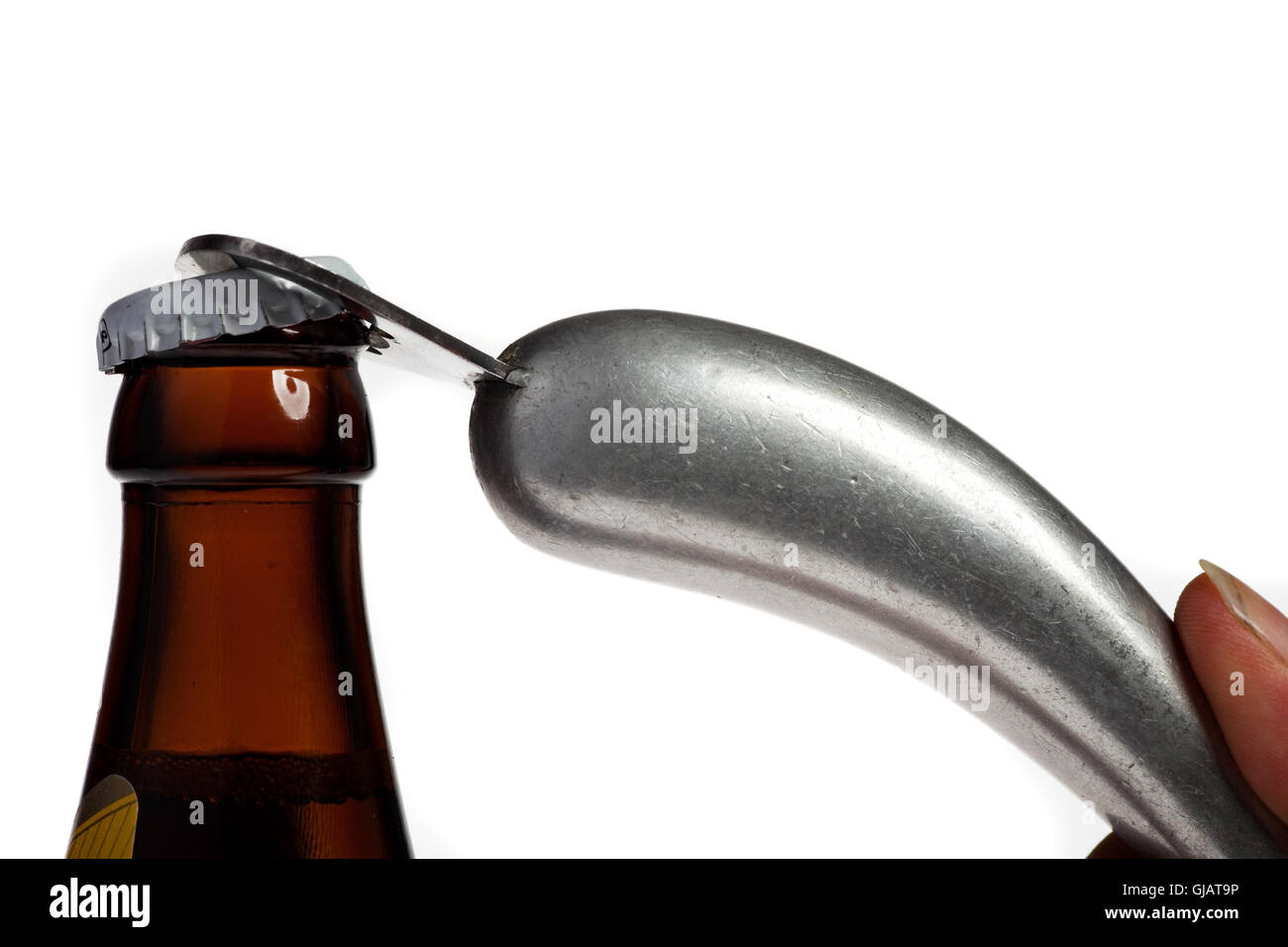 Hands opening a beer bottle on a white background Stock Photo
