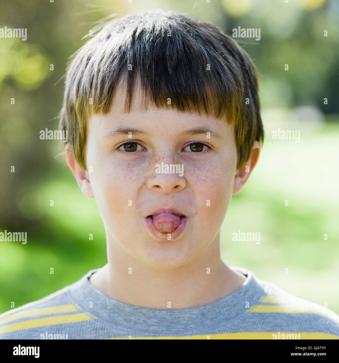 Boy Sticking Tongue Out Stock Photo Alamy