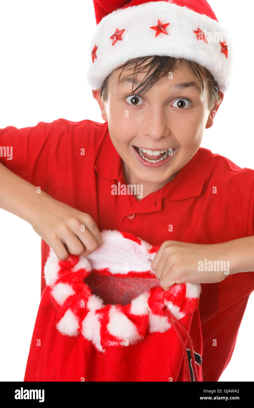 Boy holding a toy sack Stock Photo