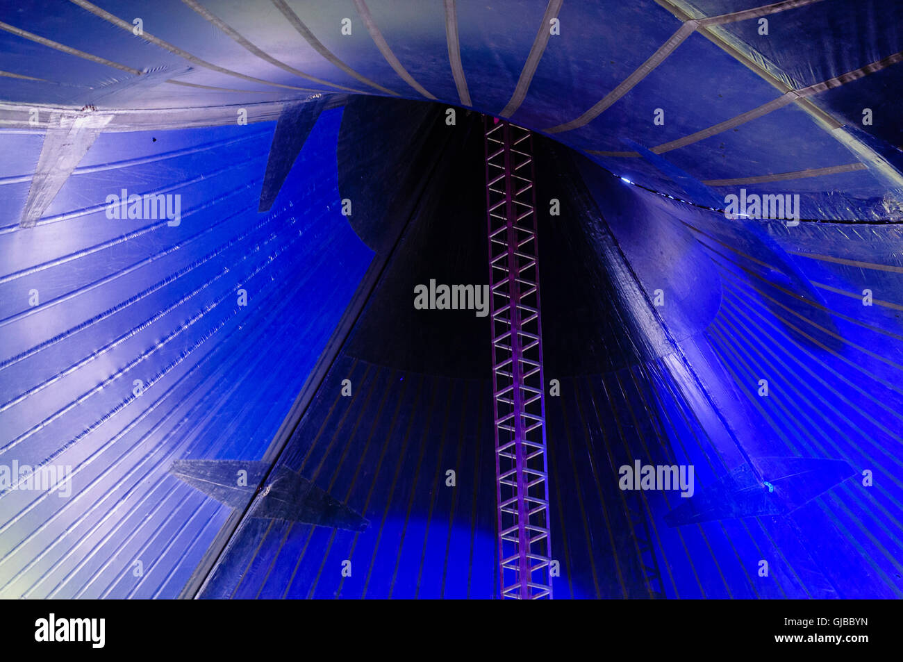 Steel tower holding up the vault of a circus big tent. Stock Photo
