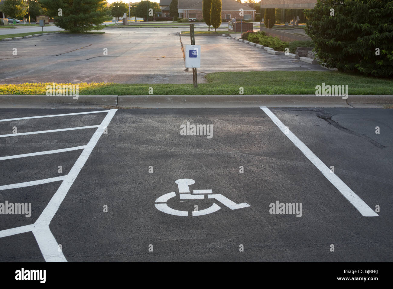 Handicap parking spaces and sign Stock Photo