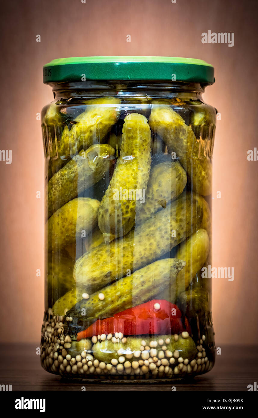 jar of cucumbers in vinegar, studio isolated Stock Photo Alamy