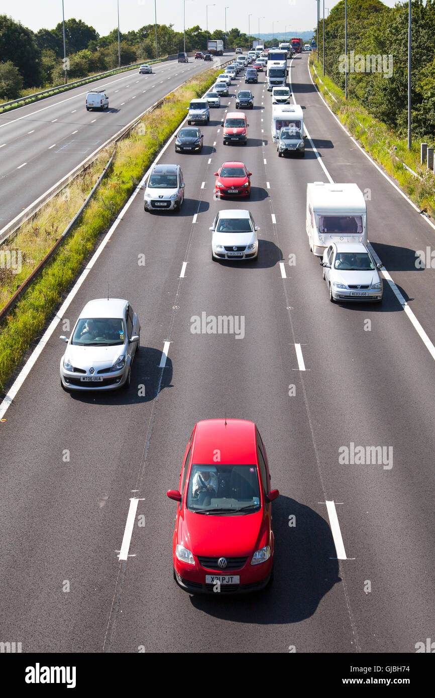 Slow Traffic affected by road works at Junction 8 on the M6 Motorway at Chorley, Lancashire, UK Stock Photo
