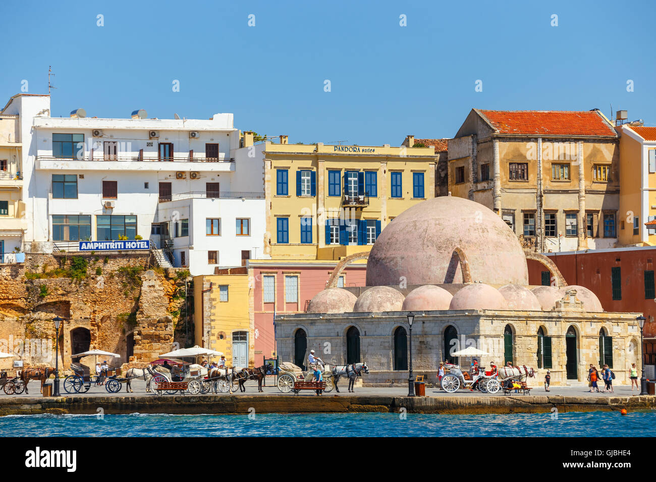 Chania, Crete - 25 Maj, 2016: Old harbor in Chania, Greece. Chania is the second largest city of Crete. Stock Photo