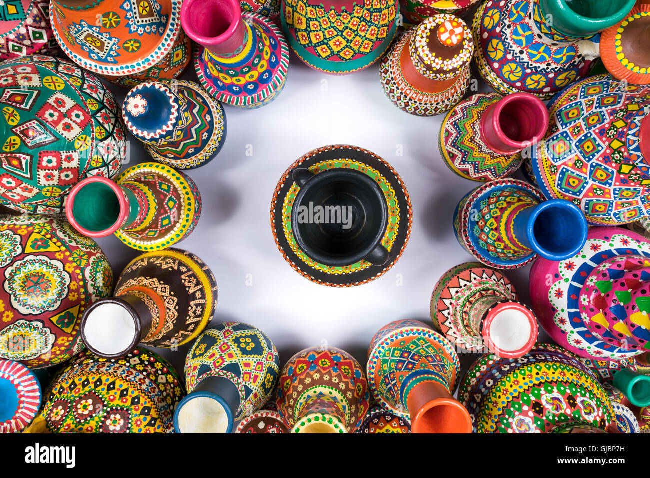 Top view showing a composition of artistic painted handcrafted pottery ...