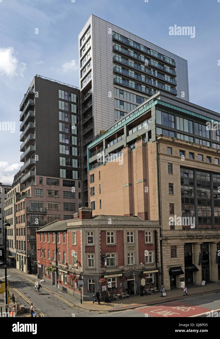 The Unicorn Hotel, dwarfed by apartments, 26 Church Street, Manchester, North West England,M4 1PW Stock Photo