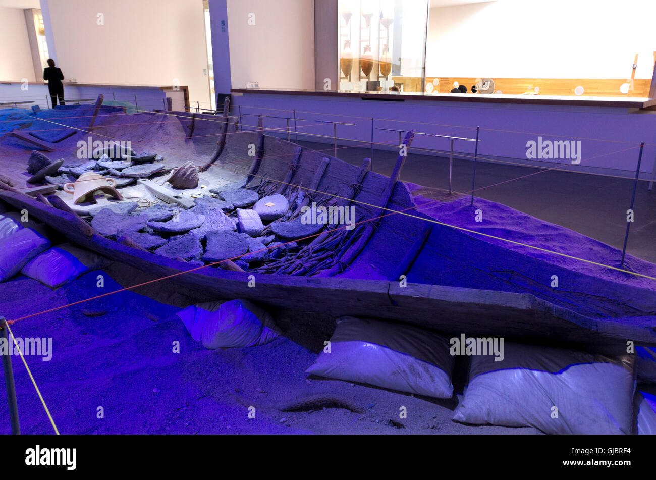 Underwater Archeology museum, remains of Phoenician shipwreck vessel Mazarron 2, displayed under protective blue light. Stock Photo