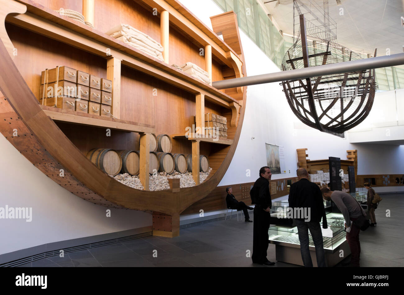 Underwater Archeology museum, model of Phoenician ship hull hangs from ceiling, cut-away of loaded ship on wall. Stock Photo