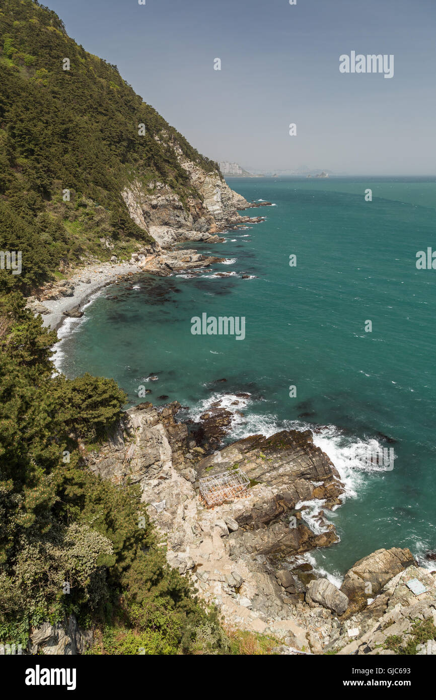View of ocean, rocky coastline and lush cliff at the Taejongdae Resort ...