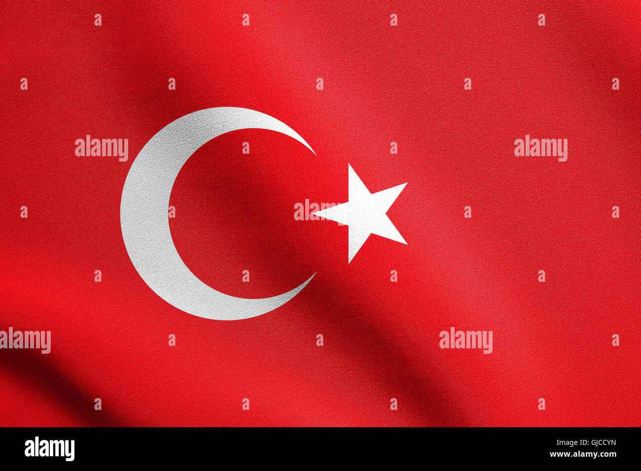 Flag of Turkey waving in the wind with detailed fabric texture. Turkish national flag. Stock Photo