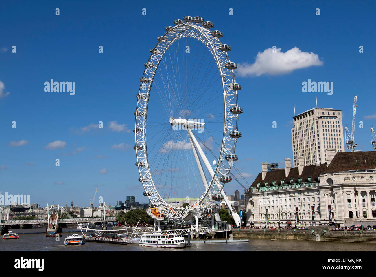 The London Eye giant Ferris wheel on the South Bank of the River Thames