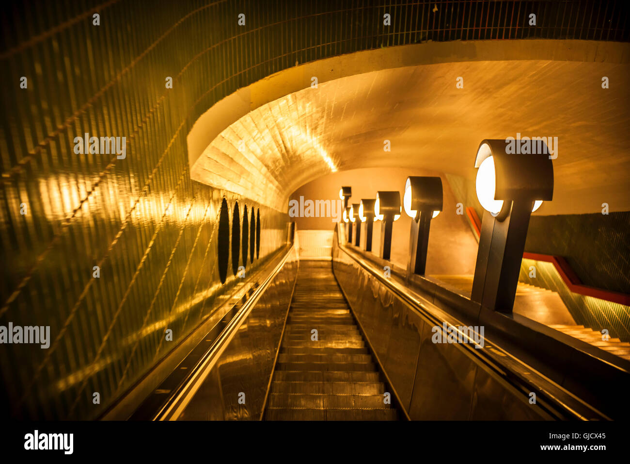 Timeless enare trying to the underground station, Berlin, Germany, warm lights, Stock Photo