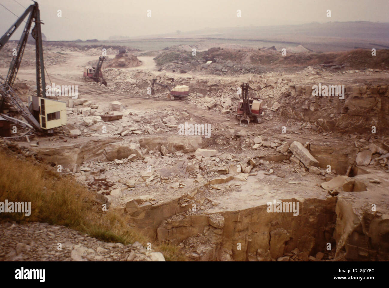 1973 view, looking east, across Clockface Quarry, with crane and