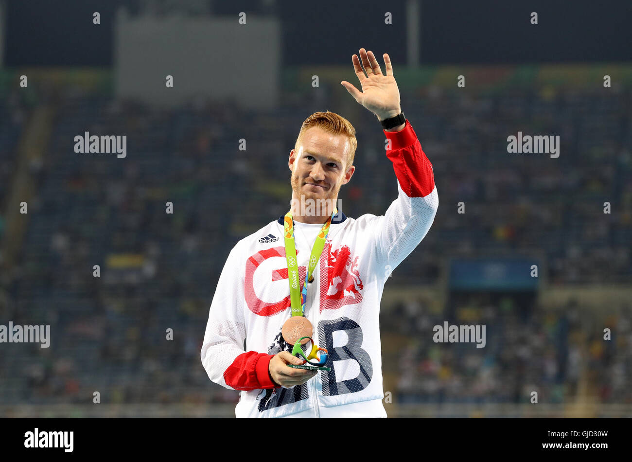 Greg Rutherford Podium Great britains greg rutherford waves hi-res stock photography and ...