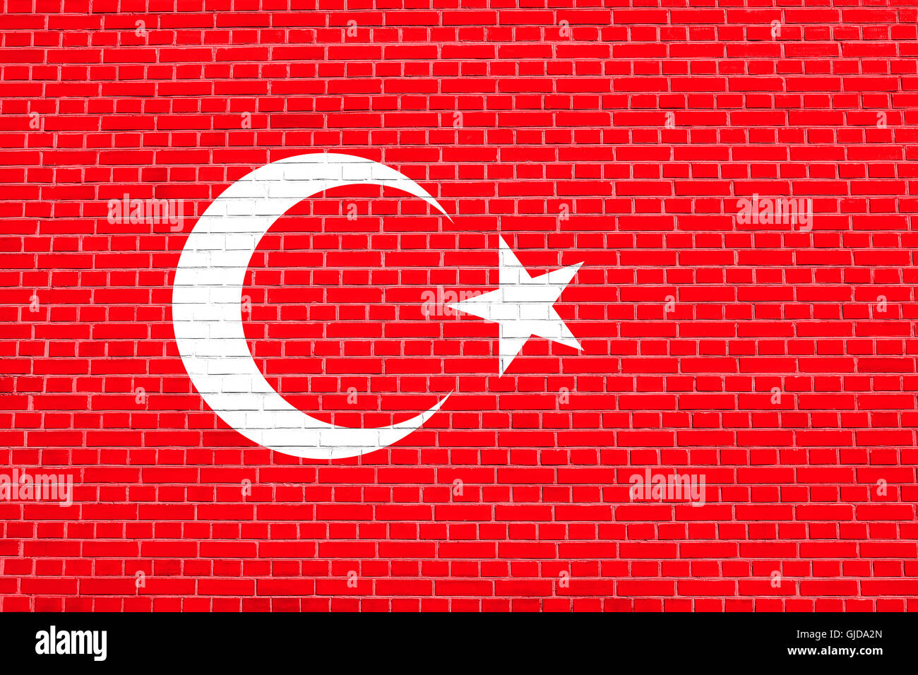 Flag of Turkey on brick wall texture background. Turkish national flag. Stock Photo
