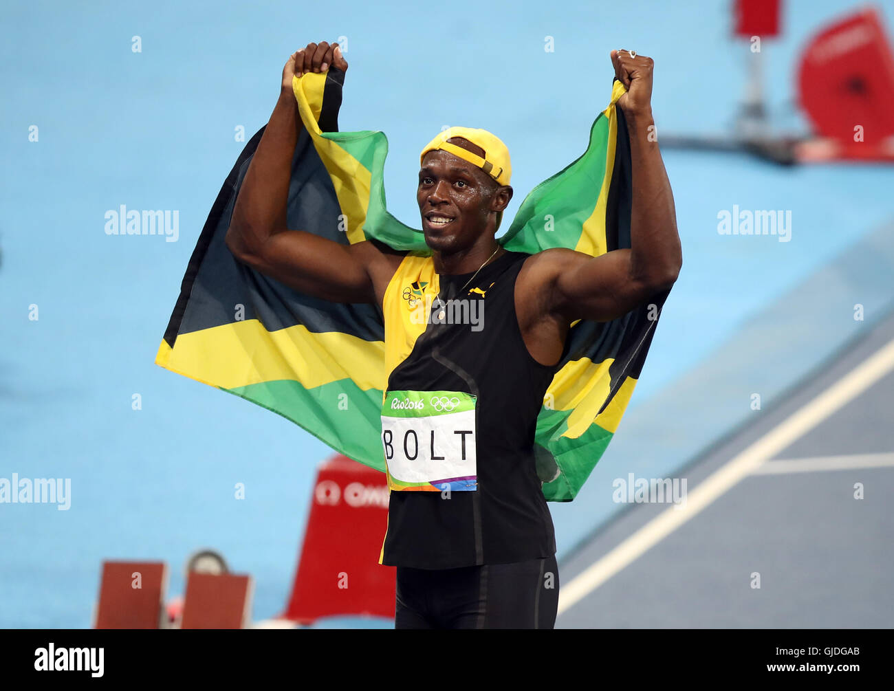 Jamaica's Usain Bolt celebrates winning the men's 100m final at the