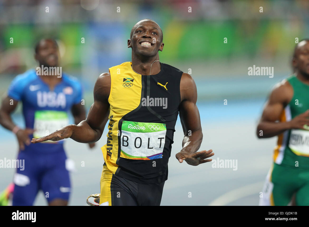 Rio De Janeiro, Brazil. 14th Aug, 2016. Jamaican athlete USAIN BOLT wins the men's 100m dash of the Rio 2016 Olympic Games at the Olympic Stadium. Bolt won the 100 meters in 9.81 seconds, securing his place as the greatest sprinter of all time and becoming the only man or woman to win the 100 three times and at consecutive Olympics. Credit:  Geraldo Bubniak/ZUMA Wire/Alamy Live News Stock Photo